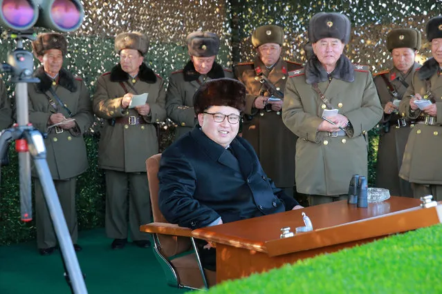 North Korean leader Kim Jong Un guides a firing contest among multiple launch rocket system (MLRS) batteries selected from large combined units of the KPA, in this undated photo released by North Korea's Korean Central News Agency (KCNA) in Pyongyang on December 21, 2016. (Photo by Reuters/KCNA)
