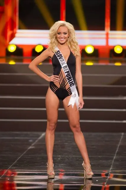 A handout picture provided by the Miss Universe Organization shows Jeanette Borhyova, Miss Slovak Republic 2013, competing in the swimsuit competition during the Preliminary Competition at the Crocus City Hall, in Moscow, Russia, 05 November 2013. (Photo by Darren Decker/EPA)