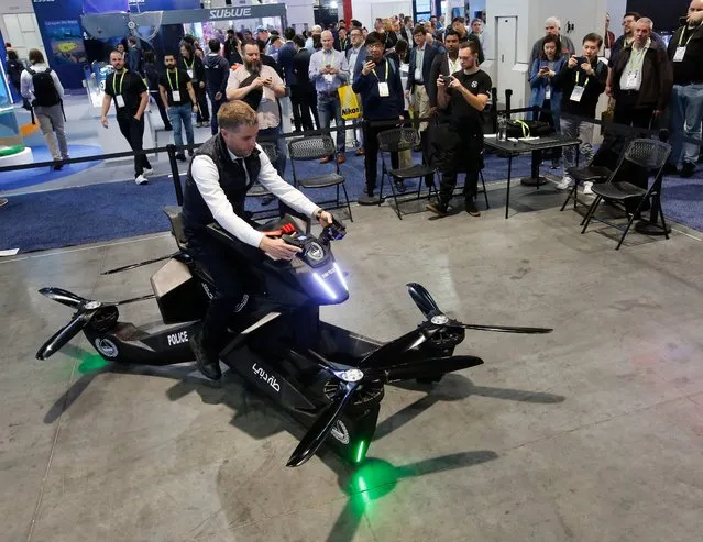 A man demonstrates a Hoverbike on the opening day of the 2019 International Consumer Electronics Show in Las Vegas, Nevada, USA, 08 January 2019. The annual CES which takes place from 08 to 11 January is a place where industry manufacturers, advertisers and tech-minded consumers converge to get a taste of new innovations coming to the market each year. (Photo by Larry W. Smith/EPA/EFE/Rex Features/Shutterstock)