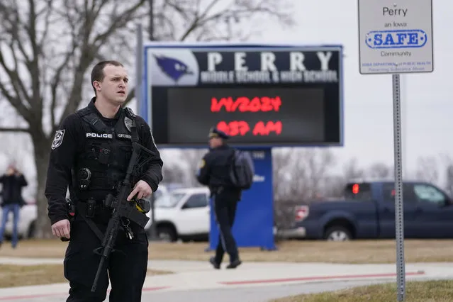 Police respond to Perry High School in Perry, Iowa., Thursday, January 4, 2024. Police say there has been a shooting at the city's high school. (Photo by Andrew Harnik/AP Photo)
