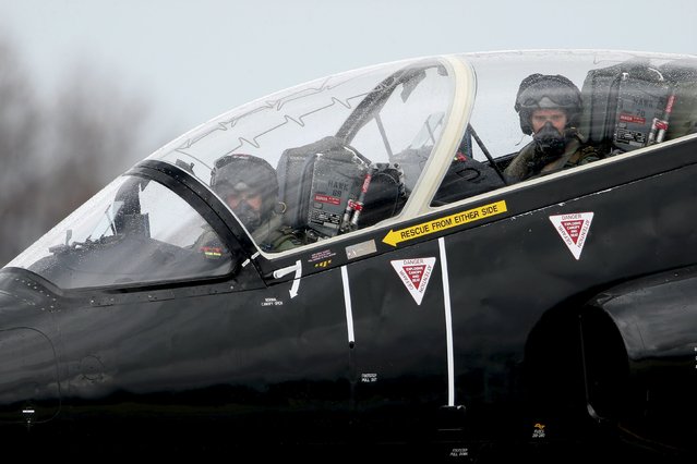 Britain's Air Force pilots prepare to take off on a Hawk fighter jet during the close air support (CAS) exercise Serpentex 2016 hosted by France in the Mediterranean island of Corsica, at Solenzara air base, March 17, 2016. (Photo by Charles Platiau/Reuters)