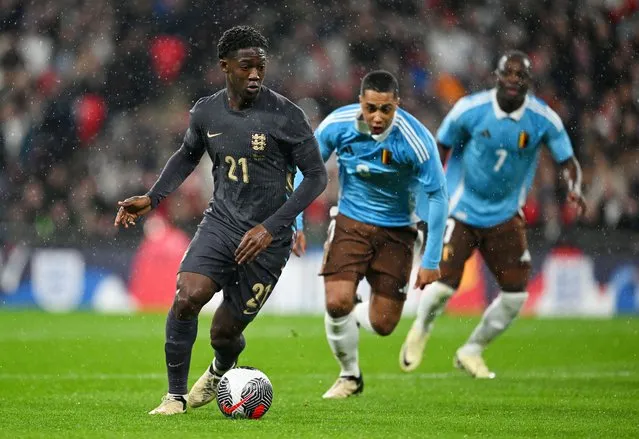 Kobbie Mainoo of England runs with the ball during the international friendly match between England and Belgium at Wembley Stadium on March 26, 2024 in London, England. (Photo by Michael Regan - The FA/The FA via Getty Images)