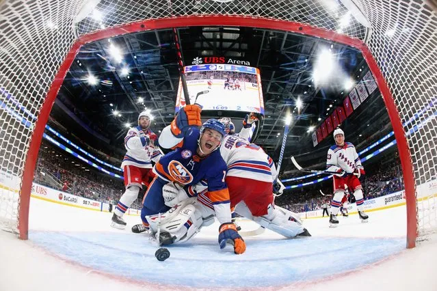 Andy Andreoff #14 of the New York Islanders celebrates his third period goal against Igor Shesterkin #31 of the New York Rangers at the UBS Arena on November 24, 2021 in Elmont, New York. The Rangers defeated the Islanders 4-1. (Photo by Bruce Bennett/Getty Images)