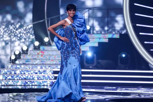Miss Singapore, Nandita Banna, presents herself on stage during the preliminary stage of the 70th Miss Universe beauty pageant in Israel's southern Red Sea coastal city of Eilat on December 10, 2021. (Photo by Menahem Kahana/AFP Photo)