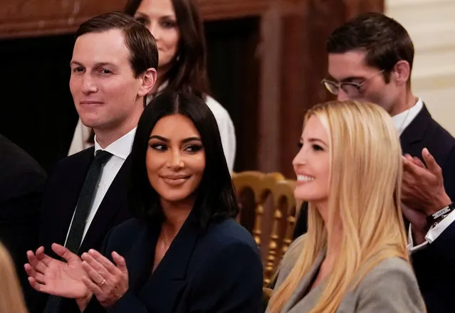 Reality TV personality Kim Kardashian sits between White House senior advisors Jared Kushner and Ivanka Trump during an event celebrating the second chance hiring rentry program for former inmates in the East Room of the White House in Washington, U.S., June 13, 2019. (Photo by Kevin Lamarque/Reuters)