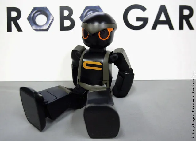 Chroino, the robot, is introduced by its creator Tomotaka Takahashi at Kyoto University
