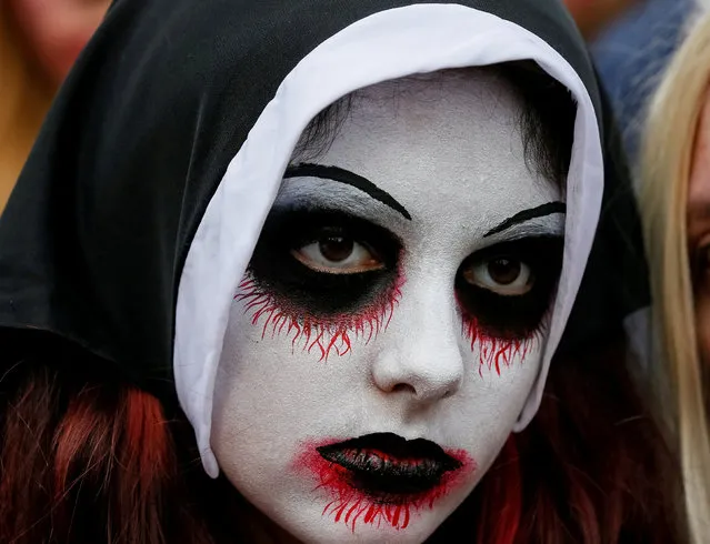 A participant takes part in a “Zombie Walk” parade in Kiev, Ukraine October 27, 2018. (Photo by Gleb Garanich/Reuters)