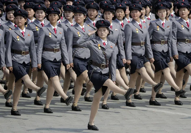 Women in uniform march across Kim Il Sung Square during a military parade on Saturday, April 15, 2017, in Pyongyang, North Korea to celebrate the 105th birth anniversary of Kim Il Sung, the country's late founder and grandfather of current ruler Kim Jong Un. (Photo by Wong Maye-E/AP Photo)