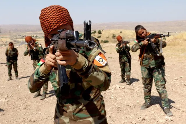 A group of Iranian Kurdish women, who have joined Kurdish Peshmerga fighters, take part in a training session in a military camp in Erbil, Iraq on July 9, 2019. (Photo by Ako Rasheed/Reuters)