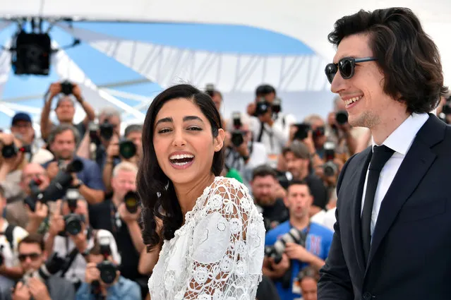 French-Iranian actress Golshifteh Farahani (L) and US actor Adam Driver pose on May 16, 2016 during a photocall for the film “Paterson” at the 69th Cannes Film Festival in Cannes, southern France. (Photo by Loic Venance/AFP Photo)