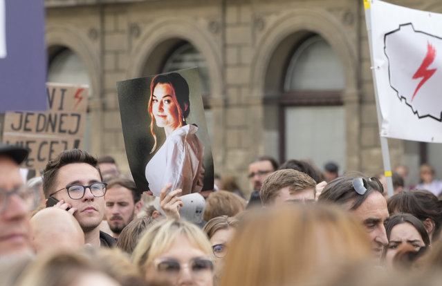 People protest Poland's restrictive abortion law in Warsaw, Poland, on Wednesday June 14, 2023. Women's rights advocates called for protests in dozens of Polish cities under the slogan “Stop killing us”, after a woman in her fifth month of pregnancy died of sepsis, the latest such death since a tightening of Poland's abortion law. (Photo by Czarek Sokolowski/AP Photo)