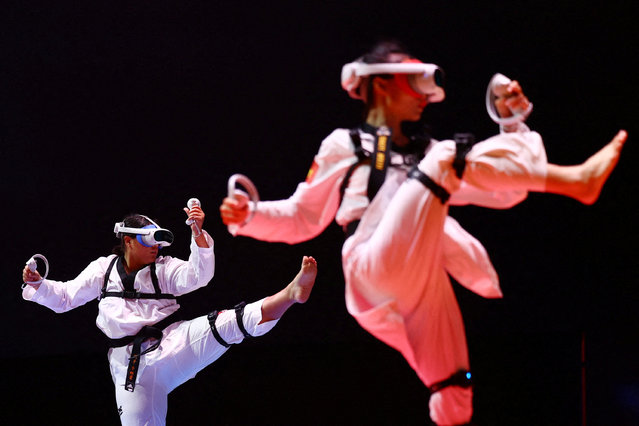 Li Tsu-Hsuan of Taiwan competes against Nguyen Thanh Hien Linh of Vietnam at the inaugural World Taekwondo Virtual Championships in Singapore on November 16, 2024. (Photo by Edgar Su/Reuters)