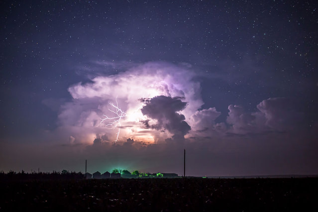 Storm filled skies in Midwestern U.S.A., captured by photographer Randy Halverson in 2013. The stunning skies in Midwestern U.S.A. captured by photographer Randy Halverson. The videographer captured rare footage of the Milky Way, the elusive Northern Lights and raging night storms in some of the most isolated regions of the U.S.A. (Photo by Randy Halverson/Barcroft Media)
