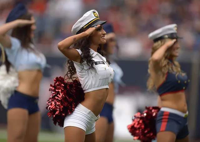 November 17, 2013; Houston, TX, USA; Houston Texans cheerleaders perform in military costumes as part of Salute to Service month festivities during the game against the Oakland Raiders at Reliant Stadium. (Photo by Kirby Lee/USA TODAY Sports)