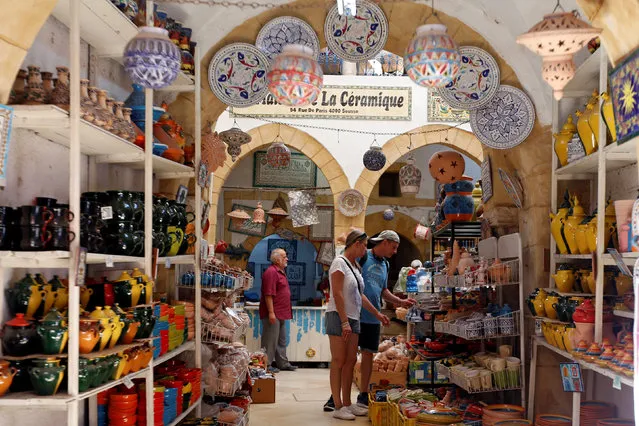 Russian tourists are seen shopping at the old medina in Sousse, Tunisia, September 30, 2017. (Photo by Zoubeir Souissi/Reuters)
