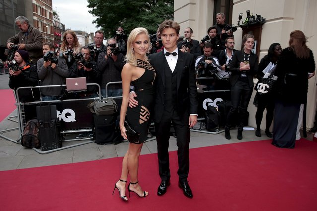 Singer Pixie Lott and her boyfriend Oliver Cheshire arrive for the GQ Men of the Year Awards at the Royal Opera House in London, Britain September 8, 2015. (Photo by Suzanne Plunkett/Reuters)