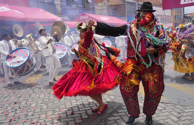 Revelers dance on the closing day of Carnival in La Paz, Bolivia, on Sunday, February 18, 2024. (Photo by Juan Karita/AP Photo)