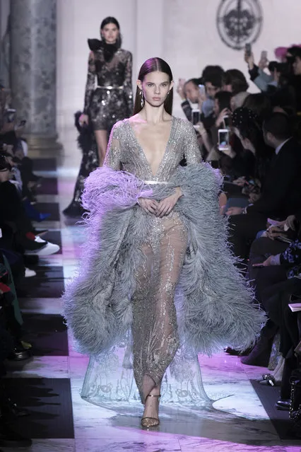 A model wears a creation for Elie Saab's Haute Couture Spring-Summer 2018 fashion collection presented in Paris, Wednesday, January 24, 2018. (Photo by Kamil Zihnioglu/AP Photo)
