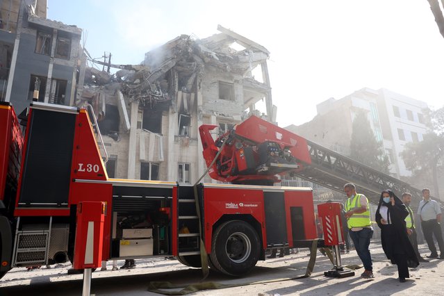 A fire truck is seen outside a building that was hit by Israeli air strikes in central Tehran, Iran, 13 June 2025. Israel confirms it has launched strikes on Iran's 'nuclear program' as blasts are heard across the country. The strikes are part of Operation Rising Lion, Israel's Prime Minister Benjamin Netanyahu said, adding Iran was a threat to “Israel's very survival”. (Photo by Abedin Taherkenareh/EPA/EFE)