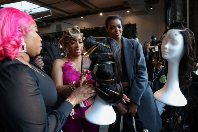 Stylists prepare hair backstage before the Sergio Hudson show during New York Fashion Week, in New York City, U.S., February 7, 2025. (Photo by Caitlin Ochs/Reuters)