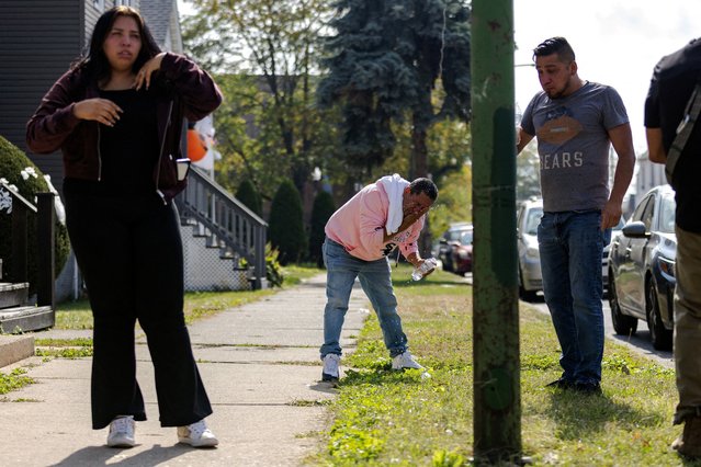 People clean out their eyes after being tear gassed by federal agents during clashes on Chicago’s South Side, on October 14, 2025. (Photo by Jim Vondruska/Reuters)