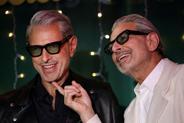 Actor Jeff Goldblum poses with a wax figure of him at the figure’s unveiling at Madame Tussauds in Times Square in New York City on November 19, 2025. (Photo by Mike Segar/Reuters)