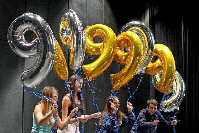 Pupils at Brighton College pose for a school photograph after receiving nine 9's in their GCSE results on Thursday, August 22, 2024. Hundreds of thousands of pupils in England, Wales and Northern Ireland are receiving grades to help them progress to sixth form, college or training. (Photo by Gareth Fuller/PA Images via Getty Images)