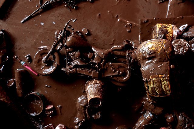 View of toys covered by mud inside a flooded house following the overflow of the “La Tecata” dam in the community of Zapotlanejo, state of Jalisco, Mexico, on August 14, 2024. One person died and 122 houses were affected during the flooding. (Photo by Ulises Ruiz/AFP Photo)