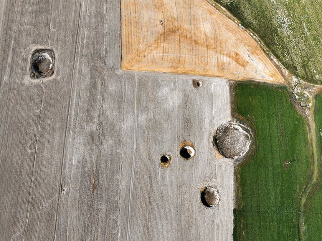 An aerial view of sinkholes (obruk), caused by some form of collapse of the surface layer, in Konya, Turkiye on September 17, 2024. Many sinkholes are observed in the fields of Eseli Plateau located within the borders of Resadiye Neighborhood in the north-west of Karapinar district, where sinkhole formation has increased rapidly in recent years. (Photo by Serhat Cetinkaya/Anadolu via Getty Images)