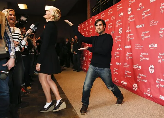 Actor Jason Schwartzman gestures at actress Judith Godreche as she is interviewed at the premiere of “The Overnight” during the 2015 Sundance Film Festival on Friday, January 23, 2015, in Park City, Utah. (Photo by Danny Moloshok/Invision/AP Photo)