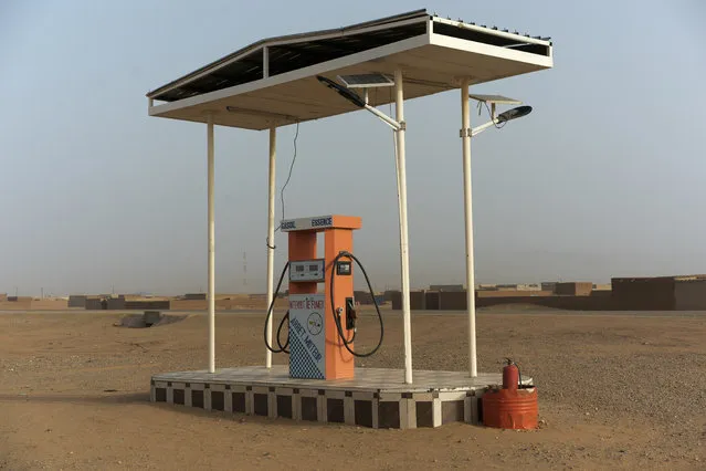 A gas pump stands in Arlit, the last major settlement in Niger's Tenere desert region of the south central Sahara on Thursday, May 31, 2018. (Photo by Jerome Delay/AP Photo)