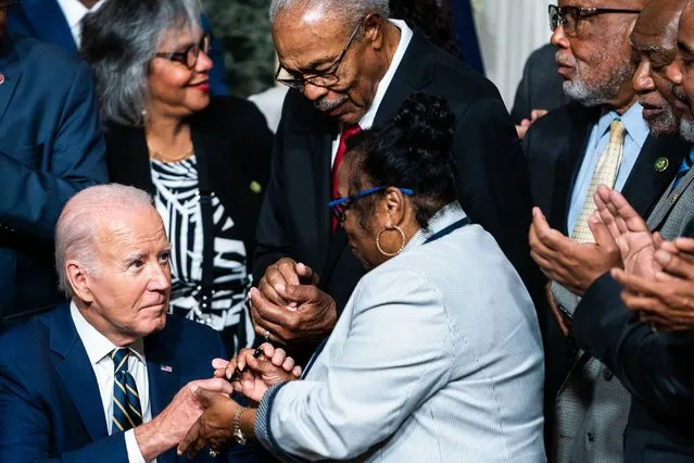 US President Joe Biden signs a proclamation to establish the Emmett Till and Mamie Till-Mobley National Monument in Illinois and Mississippi during an event in the Indian Treaty Room of the Eisenhower Executive Office Building on Tuesday, July 25, 2023. (Photo by Demetrius Freeman/The Washington Post)