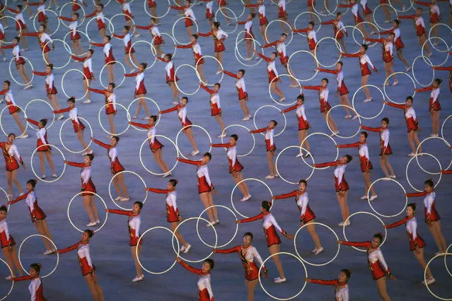 Dancers perform during “The Glorious Country” mass games at May Day Stadium in Pyongyang, North Korea, Thursday, October 25, 2018. North Korea has extended the run of the iconic mass games, which it revived last month to mark the country's 70th birthday. (Photo by Dita Alangkara/AP Photo)