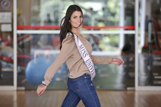 Venezuelan Andrea Diaz, Miss Chile takes part in a runway class in Santiago, Chile, Thursday, November 8, 2018. Now, as she readies for the Miss Universe pageant taking place next month in Thailand, the model hopes that the jury doesn't just focus on her physical attributes but sees her as a cosmopolitan woman who has moved around the world in pursuit of her goals. She says that she dreams of becoming a motivational speaker working with youth on self-esteem issues. (Photo by Esteban Felix/AP Photo)