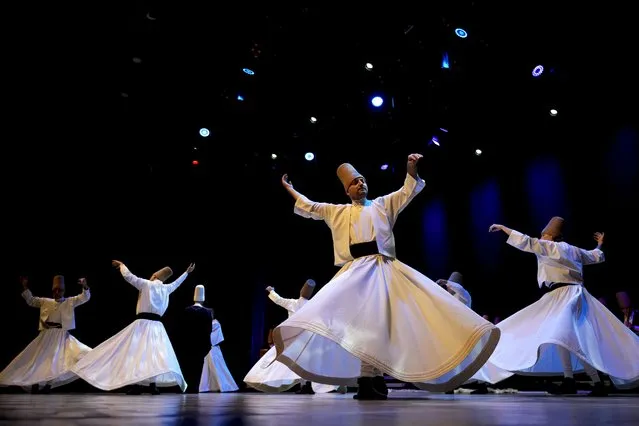 Whirling dervishes of the Mevlevi order perform during a Sheb-i Arus ceremony in Istanbul, Turkey, Sunday, December 17, 2023. (Photo by Emrah Gurel/AP Photo)