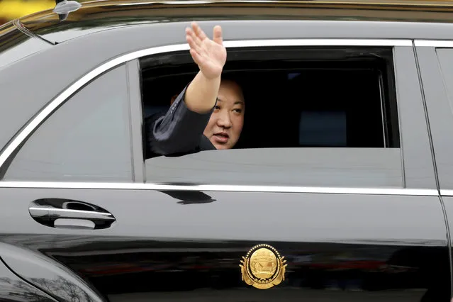North Korean leader Kim Jong Un waves from a car after arriving by train in Dong Dang in Vietnamese border town Tuesday, February 26, 2019, ahead of his second summit with U.S. President Donald Trump. (Photo by Minh Hoang/AP Photo)