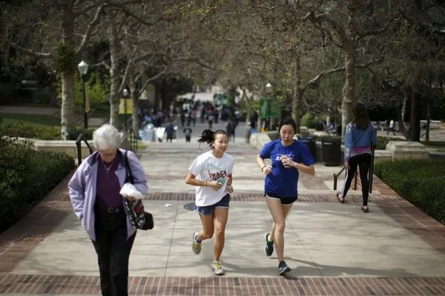 Students jog on the University of California Los Angeles (UCLA) campus in Los Angeles, California March 4, 2016. (Photo by Lucy Nicholson/Reuters)
