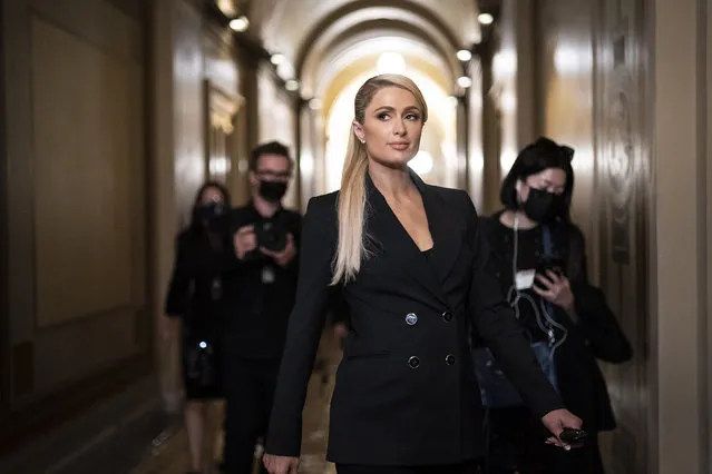 Actress Paris Hilton walks between meeting with lawmakers as she encourages legislation to establish a bill of rights for children placed in congregate care facilities, on Capitol Hill on Wednesday, Oct. 20, 2021 in Washington, DC. (Photo by Jabin Botsford/The Washington Post)