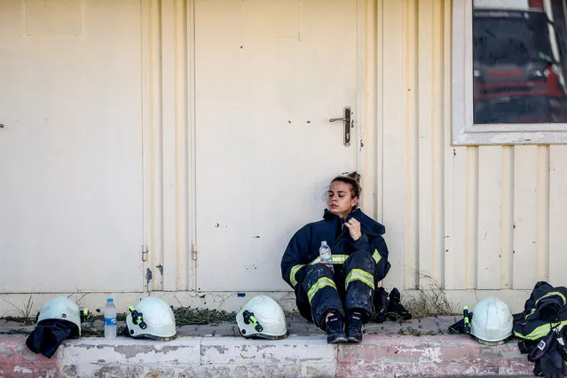 Female firefighters get ready for a practice as 24 female members of Antalya Metropolitan Municipality devotedly work for rescuing the lives and properties of people in Antalya, Turkey on September 29, 2021. (Photo by Mustafa Ciftci/Anadolu Agency via Getty Images)