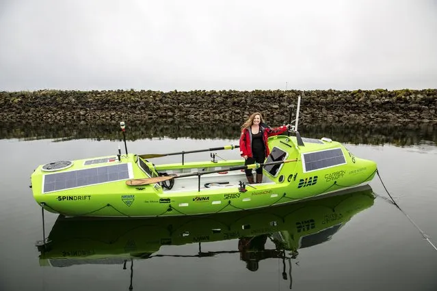 Sonya Baumstein stands in her 23-foot (7.01 meter) carbon and kevlar solo rowboat in this handout picture courtesy of Andrew Cull in Port Townsend, Washington April 12, 2015. In May 2015, Baumstein will attempt a 6,000-mile (9,600 km) crossing of the Pacific Ocean – a feat no woman has ever accomplished solo. (Photo by Andrew Cull/Reuters)