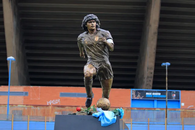 The statue of the Argentine champion, created by sculptor Domenico Sepe, was inaugurated in the square in front of the entrance gates to the Distinti sector of the “Diego Armando Maradona” stadium in Naples, Campania, Italy on November 25, 2021. (Photo by Alessandro Barone/Pacific Press/Rex Features/Shutterstock)