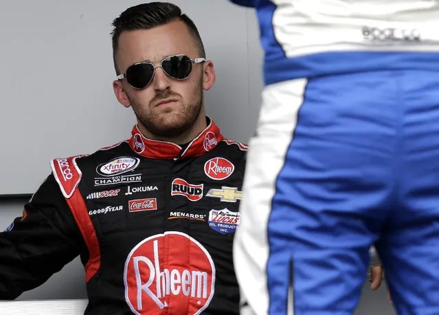Austin Dillon (33) looks to fans before the NASCAR Xfinity series auto race at Chicagoland Speedway, Sunday, June 21, 2015, in Joliet, Ill. (AP Photo/Nam Y. Huh) 