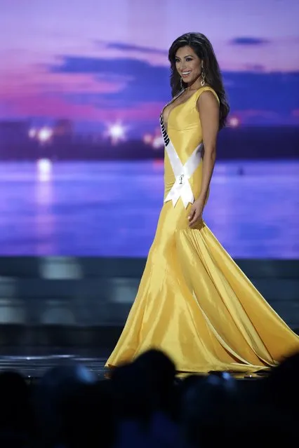 Miss California, Natasha Martinez, competes in the evening gown competition during the preliminary round of the 2015 Miss USA Pageant in Baton Rouge, La., Wednesday, July 8, 2015. (Photo by Gerald Herbert/AP Photo)