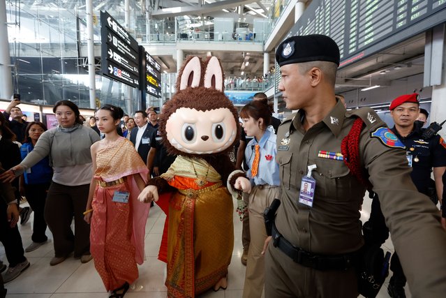 A Chinese art toy character Labubu arrives to Bangkok, during a campaign to lure Chinese visitors at Suvarnabhumi International Airport in Samut Prakan province, Thailand, 01 July 2024. The Tourism Authority of Thailand invests one million baht (27.2 million US dollars) in a co-campaign with China's renowned Pop Mart art toy company by using a Chinese art toy, Labubu the devil doll with pointed ears and serrated teeth, as a cultural ambassador to lure Chinese visitors as well as marking the 50th anniversary of Thailand and China relationships. (Photo by Narong Sangnak/EPA/EFE)