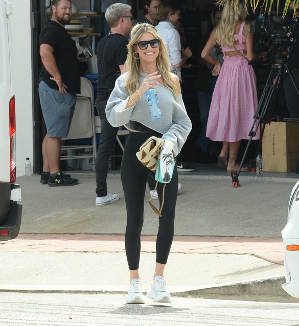 American TV personality Christina Hall is spotted arriving to the set of The Flip Off in California on August 8, 2024. Hall was all smiles just days after ex Josh Hall was seen moving his personal belongings out of her Newport Beach home. Christina is back to work amid divorce news and as Josh drops out of the show. Hall was seen hugging the crew members as she arrives filming in San Clemente, California. (Photo by The Image Direct)