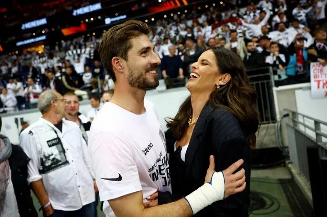Eintracht Frankfurt's Kevin Trapp celebrates with girlfriend Izabel Goulart after reaching the Europa League final after the match with West Ham United, Deutsche Bank Park, Frankfurt, Germany on May 5, 2022. (Photo by Kai Pfaffenbach/Reuters)