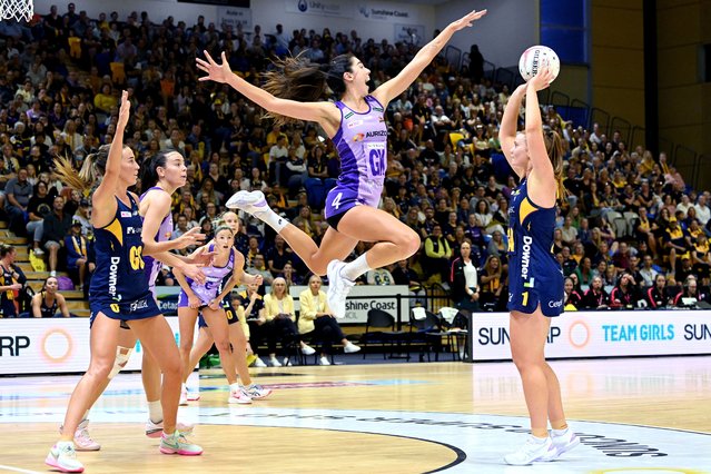 Steph Wood of the Lightning shoots as Remi Kamo of the Firebirds attempts to block her shot during the round 14 Super Netball match between Sunshine Coast Lightning and Queensland Firebirds at University of Sunshine Coast Stadium, on June 18, 2023, in Sunshine Coast, Australia. (Photo by Bradley Kanaris/Getty Images)