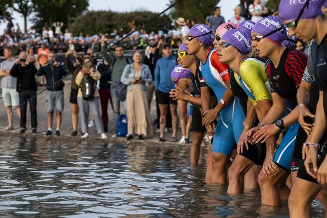 Athletes compete at the swim leg of  the  IRONMAN 70.3 Pays d'Aix on May 22, 2022 in Marseille, France. (Photo by Jan Hetfleisch/Getty Images for Ironman)