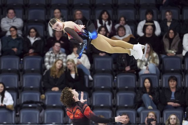 Kelly Ann Laurin, top, and Loucas Ethier, bottom, of Canada, compete in the pairs short program at the Skate Canada International figure skating competition in Halifax, Nova Scotia, Friday, October 25, 2024. (Photo by Darren Calabrese/The Canadian Press via AP Photo)