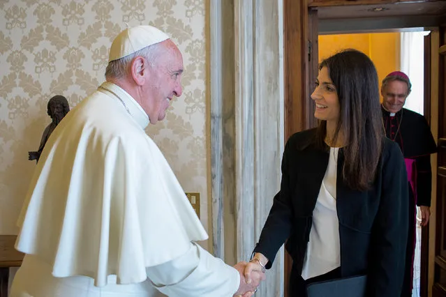 Pope Francis meets Rome's Mayor Virginia Raggi during a private audience at the Vatican July 1, 2016. (Photo by Osservatore Romano/Reuters)